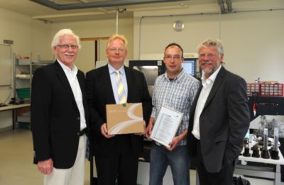 Pressefoto: , 2010 © Klaus Hoffmann (1) und Klaus Rüffel (4) von der GWG Göttingen zusammen mit Carsten Kleine (2) und Sven Quentin (3) von GoePaTec (Nr von links nach rechts)